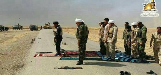 Des théologiens côte à côte avec des combattants de la mobilisation populaire irakienne