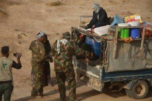 Les forces irakiennes et de la mobilisation populaire viennent en aide aux familles de Mossoul 3