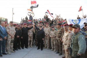 Le Premier Ministre Irakien Heydar Abadi lève le drapeau irakien dans le ciel de Mossoul et a annoncé la libération totale de Mossoul7
