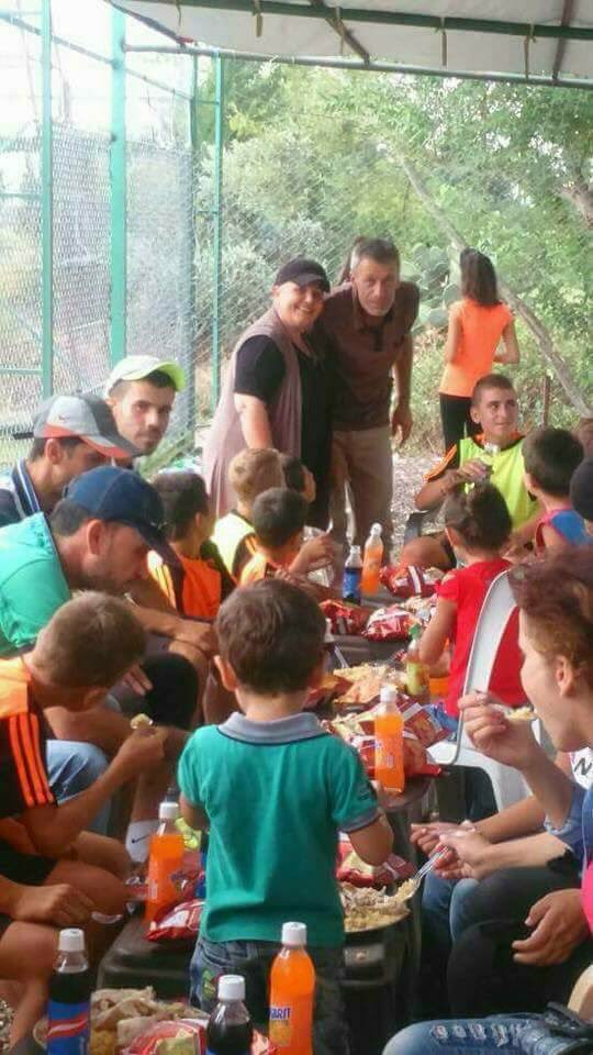 Une des mères qui a consacré son temps durant l'Aïd Al Adha pour nourrir les soldats de l'Armée Arabe Syrienne ainsi que les enfants des martyrs3